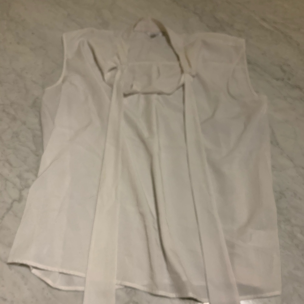 White sleeveless top